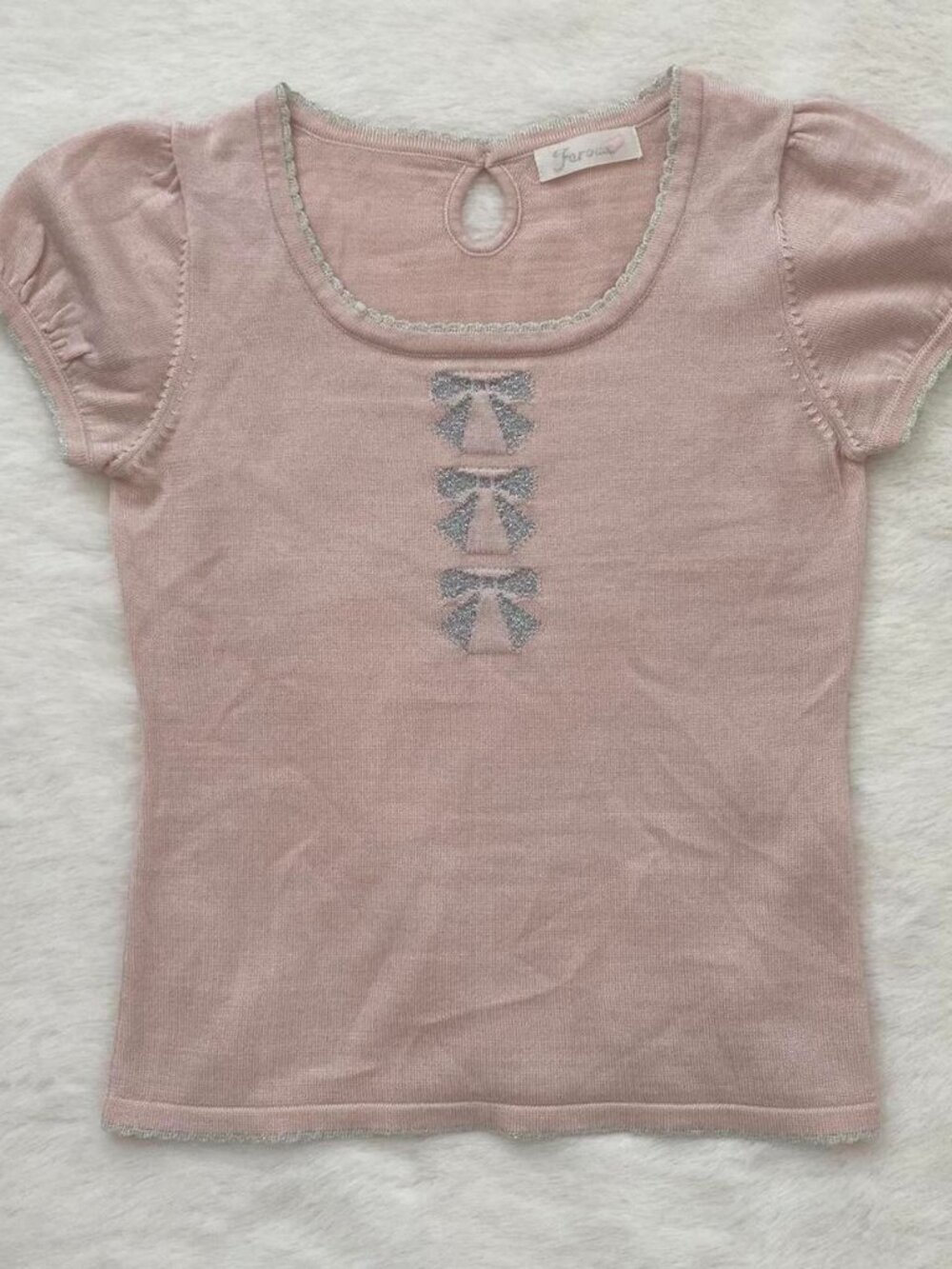 japanese light pink puff sleeve top with bow details